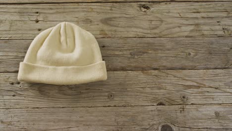 video of close up of hat on wooden background