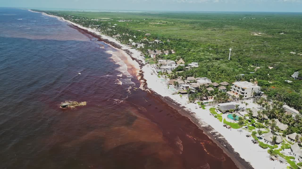 Contaminated coastal erosion, Mexican beach vacations, aerial view