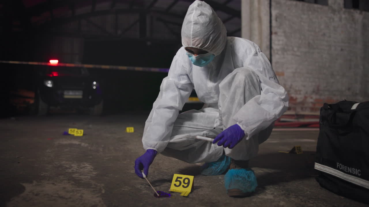 Forensic scientist at crime scene