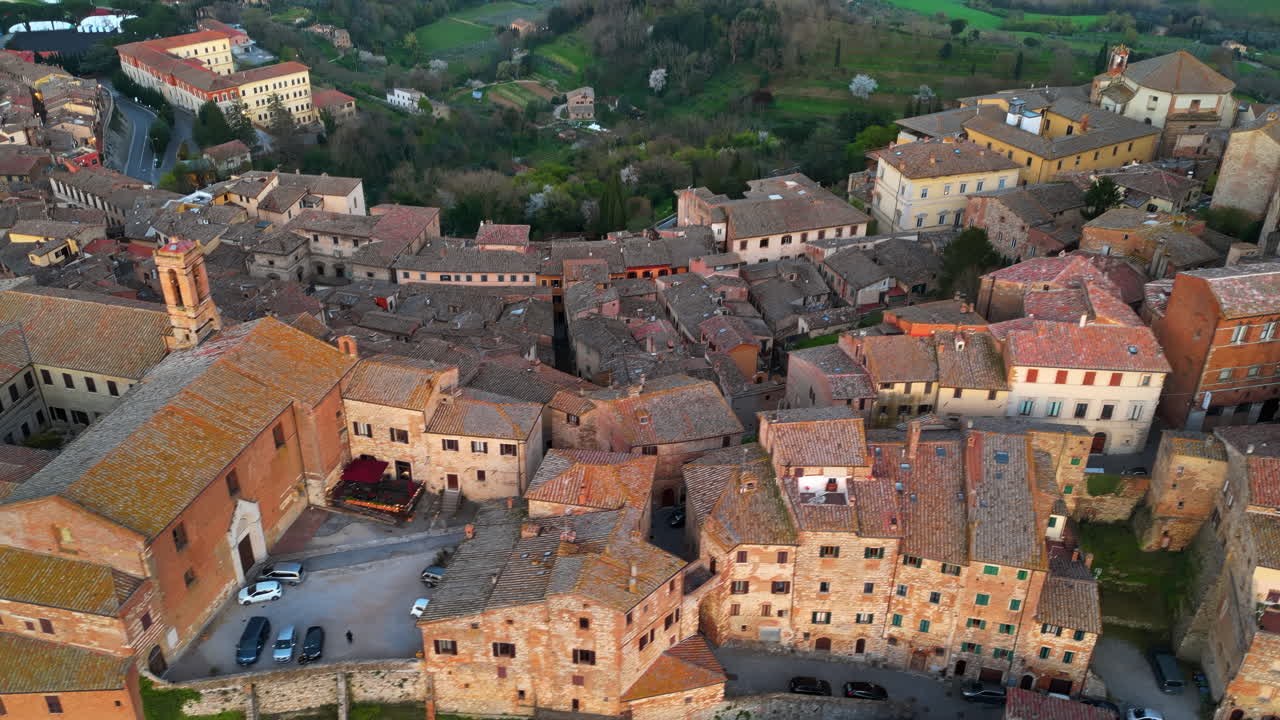 Aerial drone view of the Montepulciano medieval hilltop town in Tuscany, Italy, surrounded by vineyards