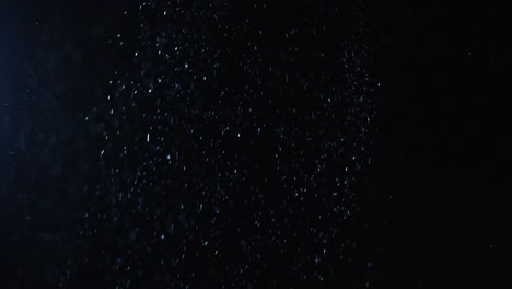 fondo negro de 4k de partículas, polvo y humo en movimiento