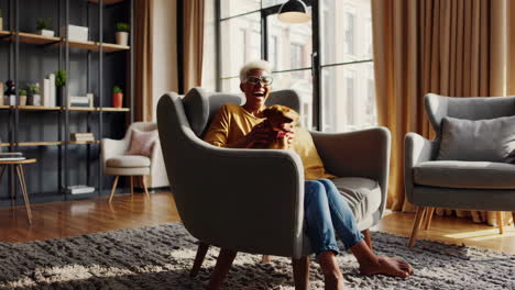happy senior woman playing with her dog in the living room