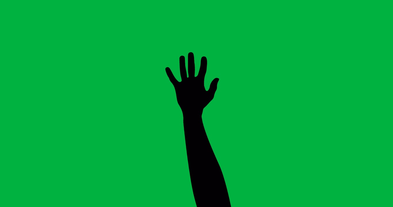 Silhouette di una mano che fa gesti su schermo verde