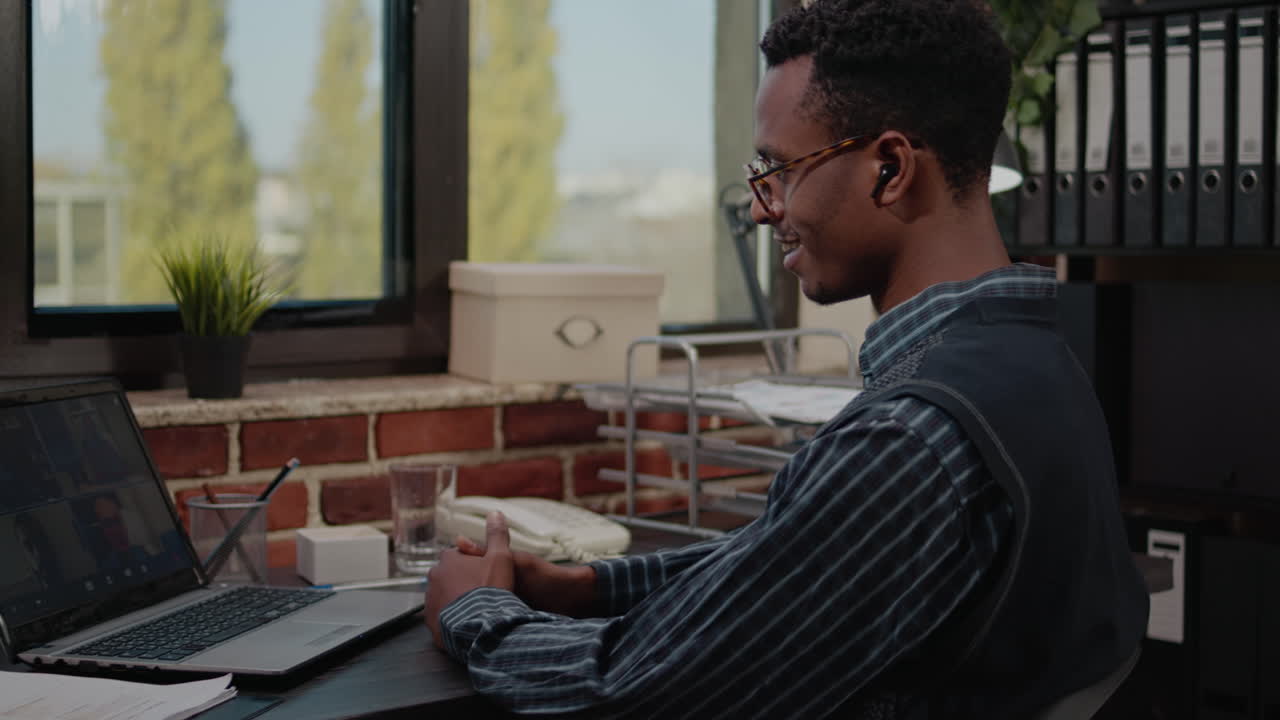 Employee attending business meeting on videoconference