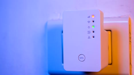 cinemagraph of blinking signal connection status led lights in wifi repeater