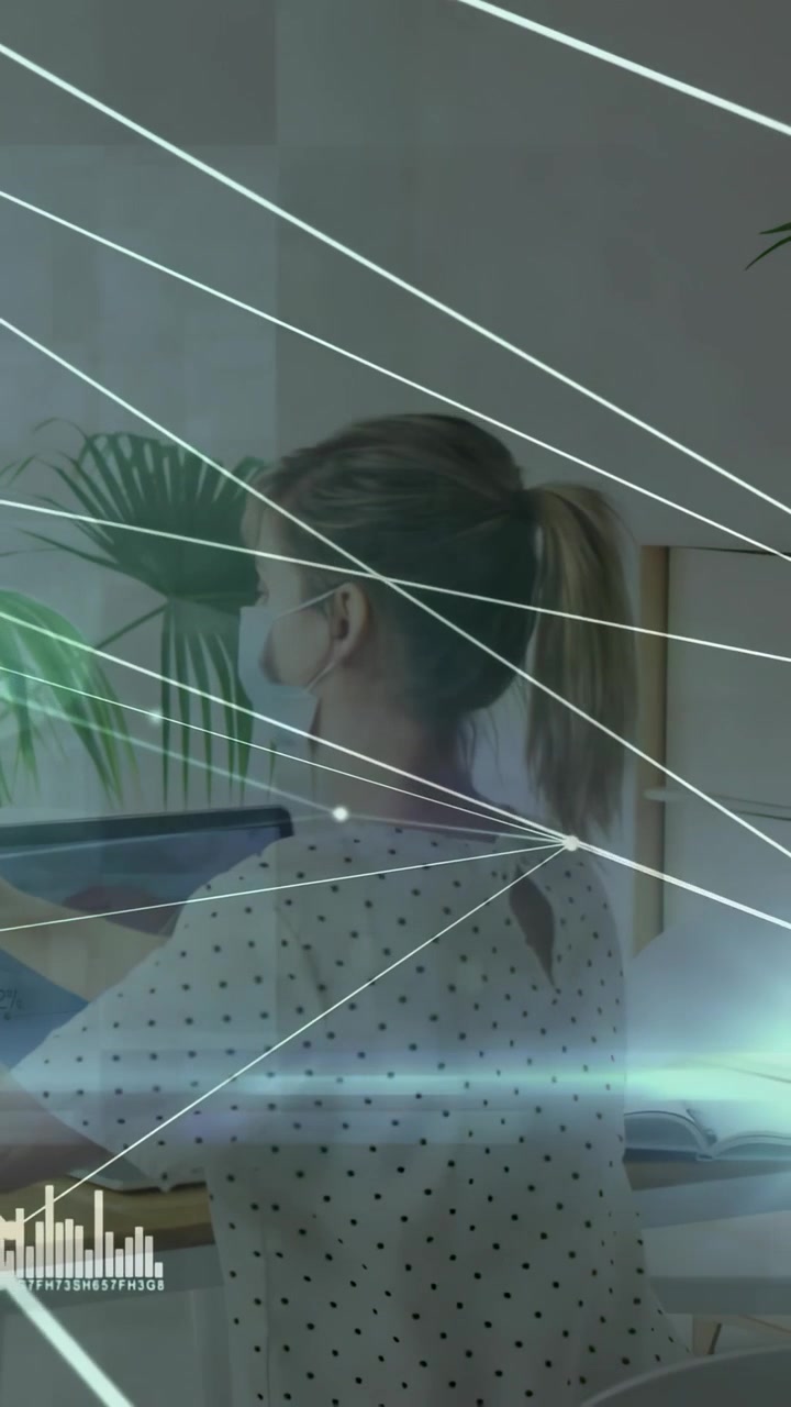 Vertical video: Female pro tapping tablet starting tech overlay for data, nodes rising then fading