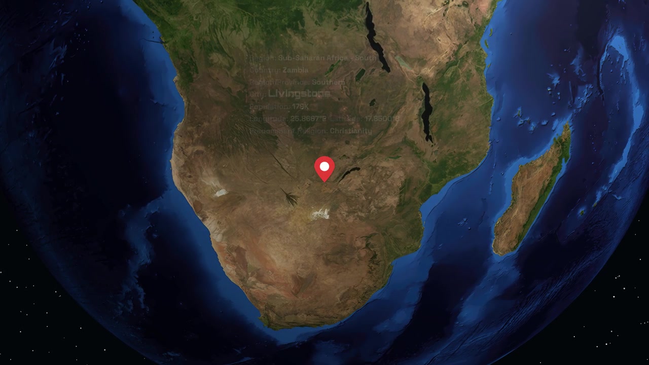 A digital globe rotates and zooms into Southern Africa, highlighting Livingstone with informative text