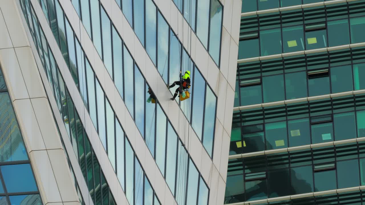 Window Cleaners on a Skyscraper