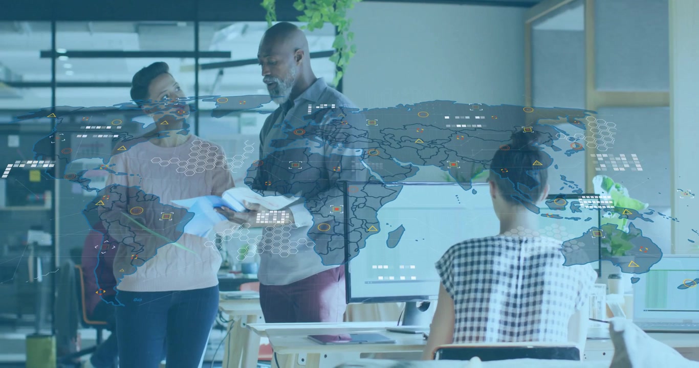 Tech analyst exchanging documents with team lead and activating data map overlay for analytics