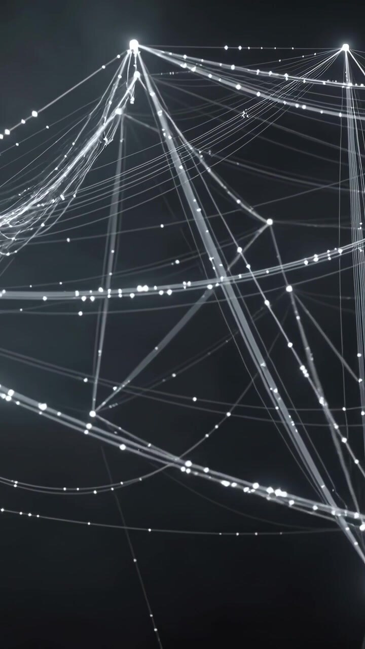 Video verticale: Panoramica della telecamera che mostra una rete di nodi luminosi nel vuoto, con filamenti che si spostano e punti pulsanti