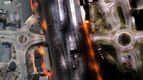 aerial timelapse of downtown, and railway station in the city of kedzierzyn-kozle, poland - day to night transition