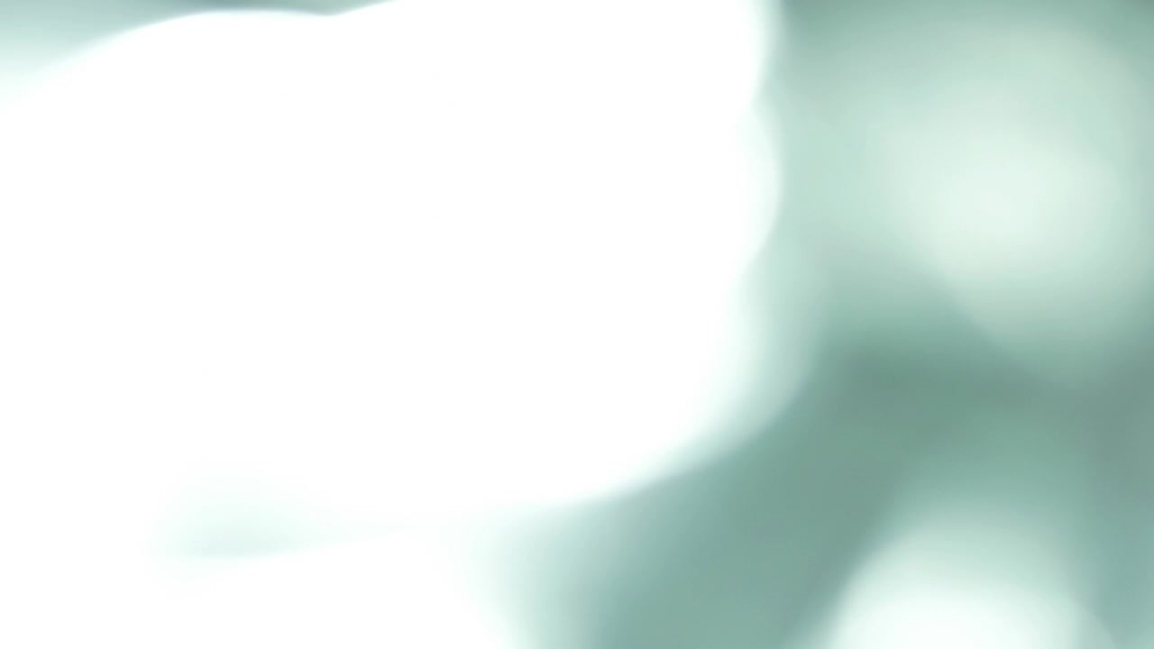 Abstract Light Leaks and Lens Flares Transitioning on Black Background