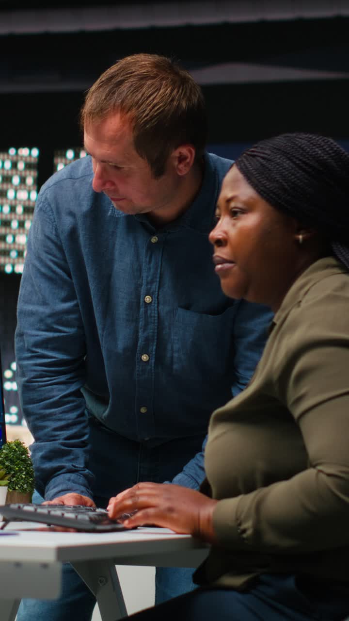 Vertical Video Multiethnic editors team using AI machine learning for editing content