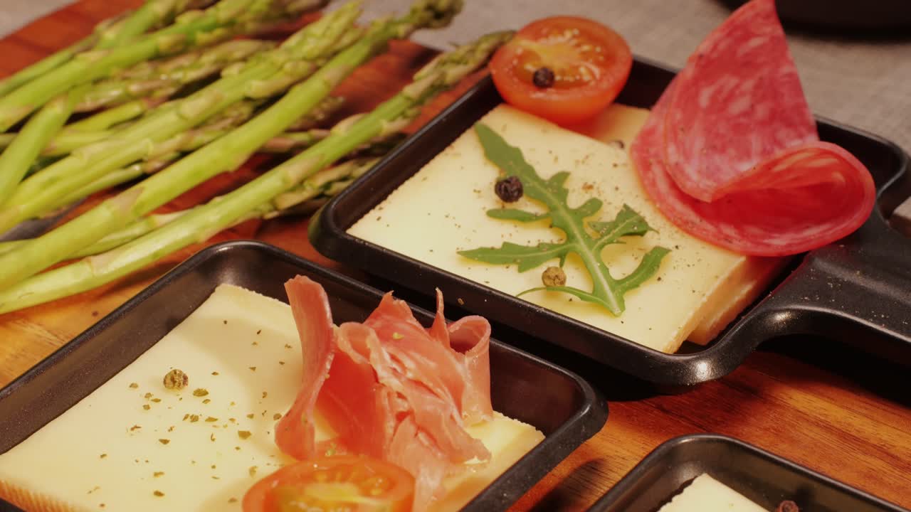 Italian or Spanish restaurant with traditional tapas food, Spanish cuisine, delicious tapas and cheese plate, bruschetta with cheese, olives dry tomatoes and tasty sandwich bar appetizer, buffet