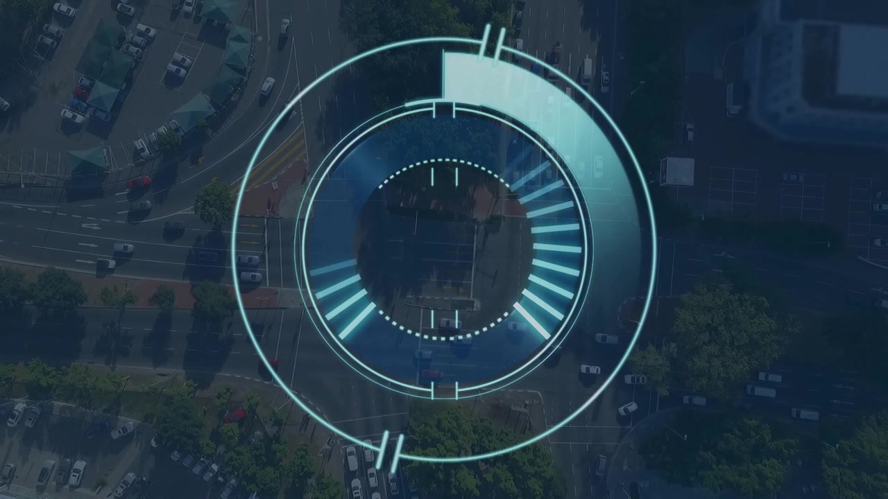 Animation of illuminated radar over aerial view of city roads with moving vehicles
