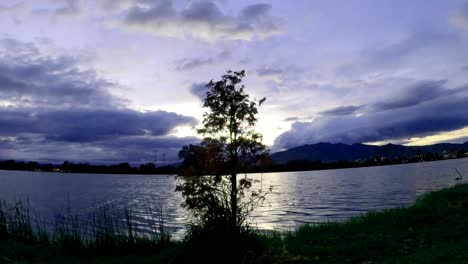 hyperlapse of a sunset on the shores of a lagoon