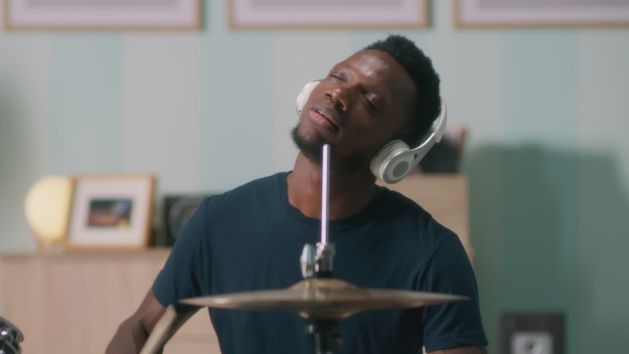 Merry Christmas Vacation Multiracial Man and Woman Using Smartphone at Home Happy Black Guy and Merry Christmas Vacation Multiracial Man and Woman Using Smartphone at Home Happy Black Guy and Caucasian Lady Having Fun Relaxing on Sofa in Living Room with Decorated Xmas Tree Joyful People