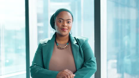 confident businesswoman in teal jacket