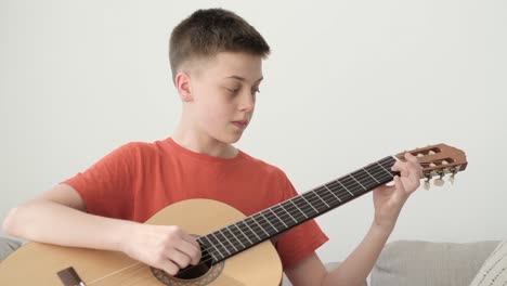 guy pretending to play guitar friends talking young cheerful people in casual clothes guy pretending to play guitar friends talking young cheerful people in casual clothes have a picnic outdoors in the forest