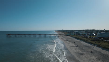 lapping waves on kure beach northern california tilting aerial