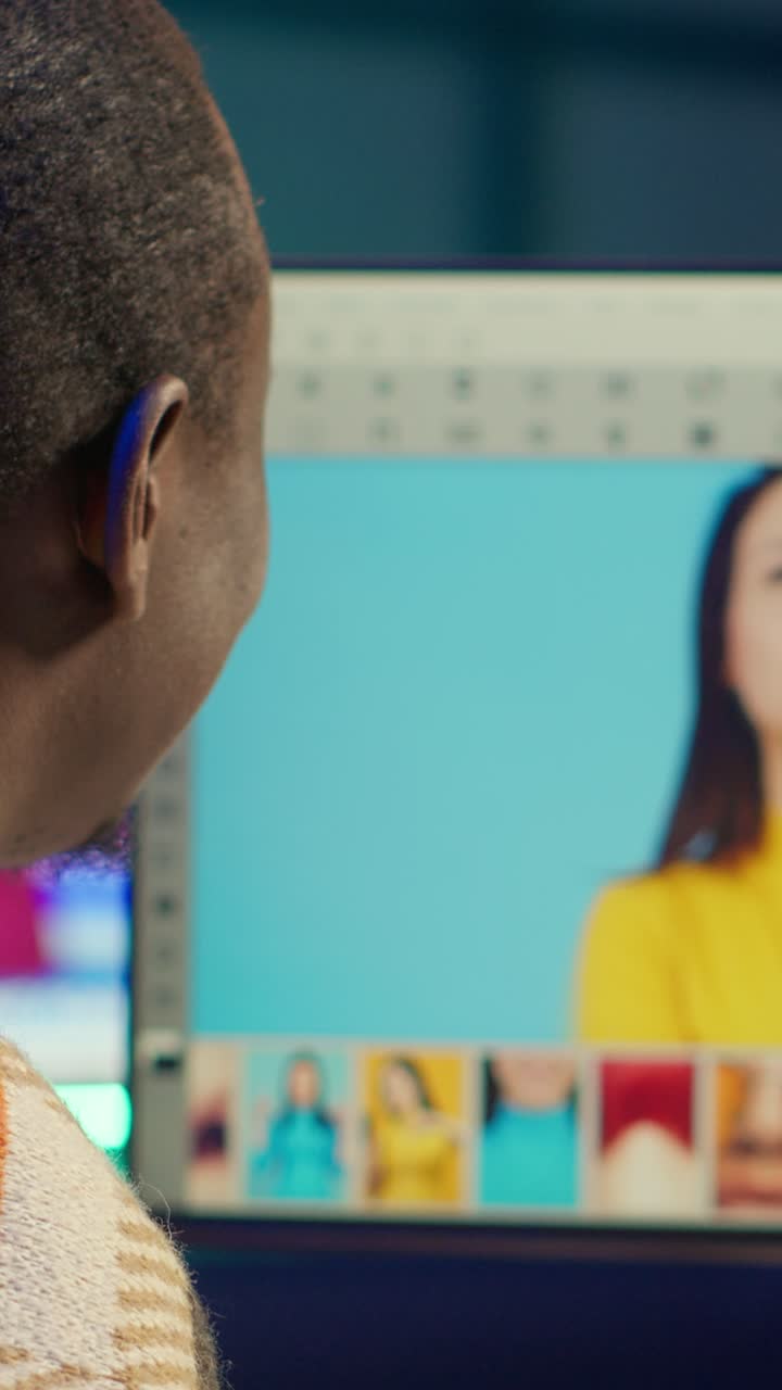 Vertical Video Remote graphic designer using advanced editing software and isolated display