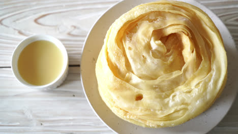 Masa-Roti-Crujiente-Frita-Con-Leche-Condensada-Azucarada