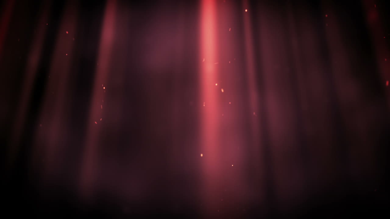 Punti luminosi che appaiono in un raggio rosa.
