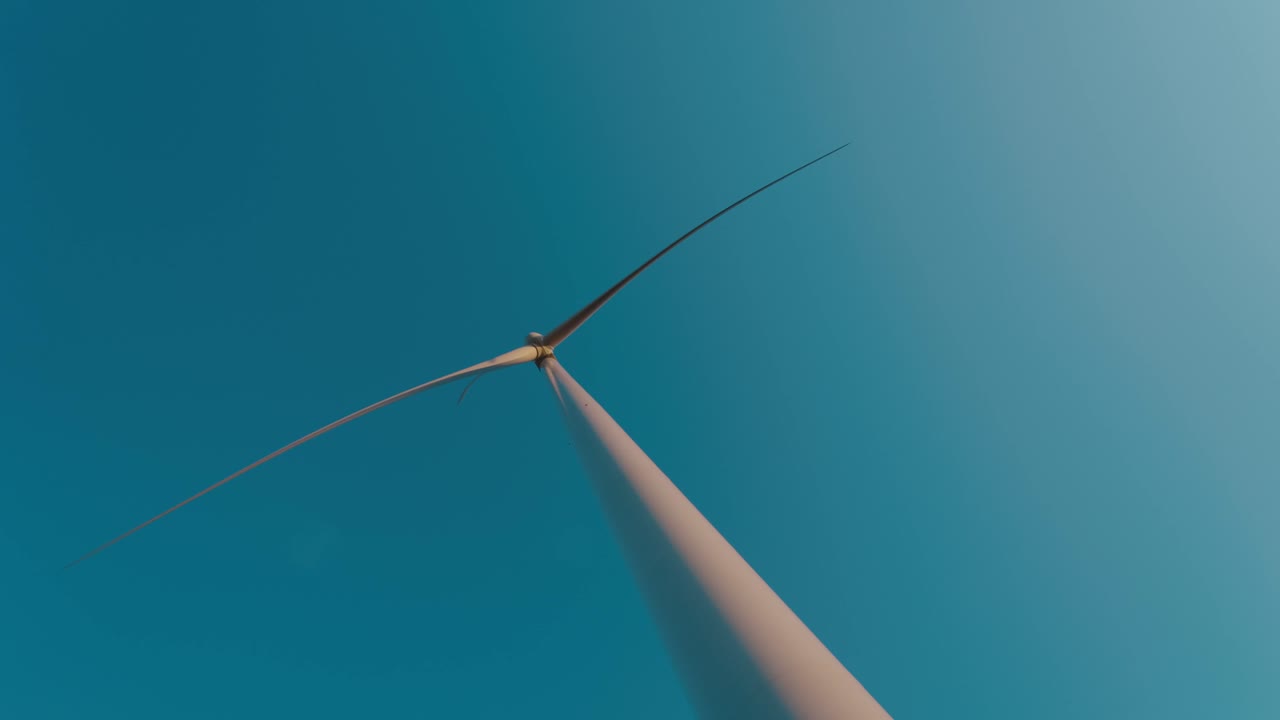 Wind Turbine Against Blue Sky