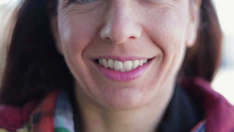 close up shot of mature woman with toothy smile