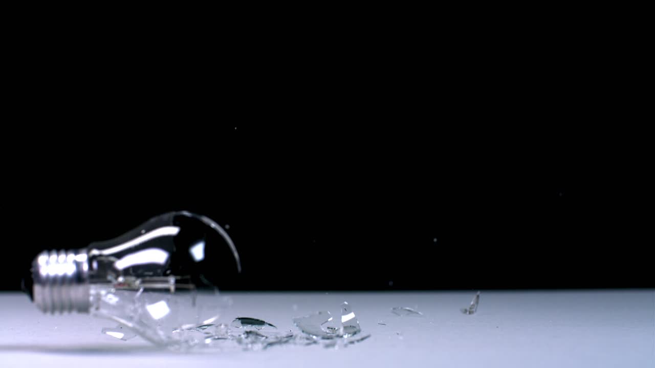 Broken Lightbulb and Glass Fragments