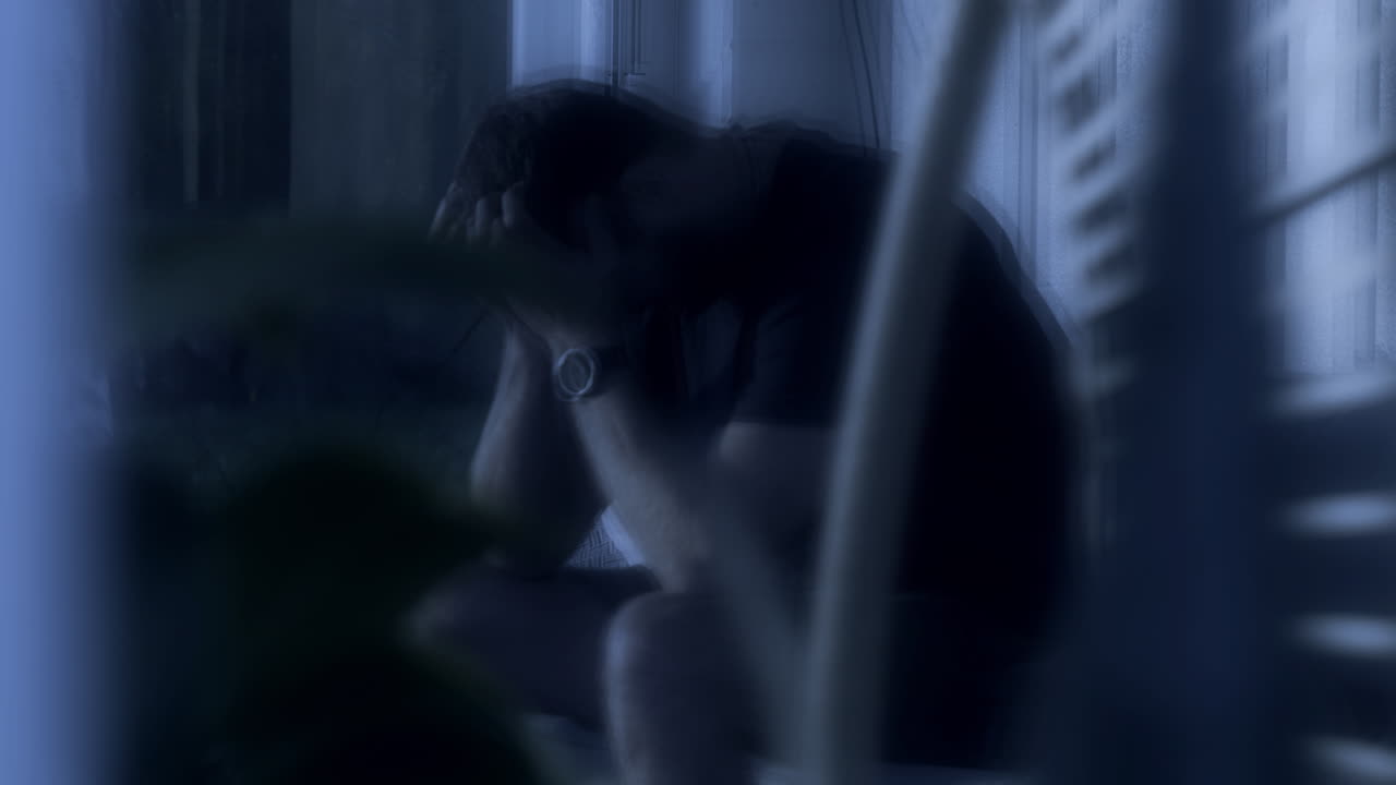 Mental illness or sleep deprivation concept, Man Having Panic Attack or Anxiety Crisis at night