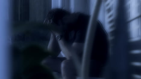 mental illness or sleep deprivation concept, man having panic attack or anxiety crisis at night