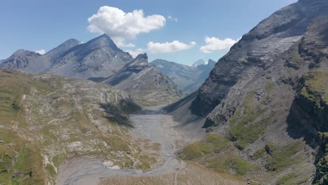 Jib-down-of-a-dry-river-bed-in-the-mountains