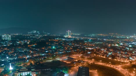 beautiful cityscape of kuala lumpur at night with traffic. time lapse