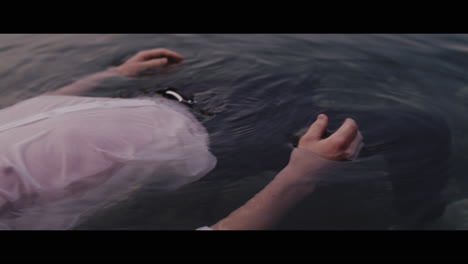 person floating in water
