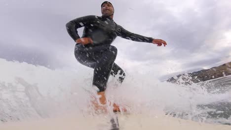 surfer surfing tropical ocean wave attacking off the lip in backend mood-1