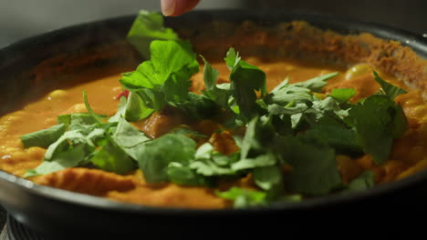yellow boiling sauce on pan close-up. asian cuisine concept. curry is a dish with a sauce seasoned with spices. curries may contain fish, meat, poultry, or shellfish, either alone or in combination with vegetables. others are vegetarian.