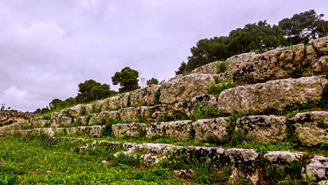 Timelapse-clip-of-moving-clouds-during-the-day-captured-from-an-old-monumental-architecture