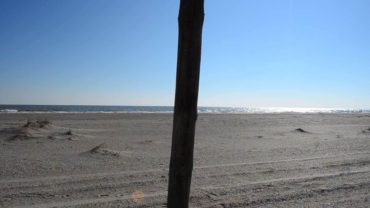 Column in sand. Column in sand against the sky