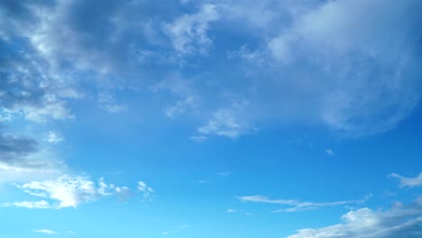 white clouds over blue sky - timelapse