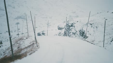 the first snowfall on the sognefjellsvegen - the highest mountain pass road in northern europe