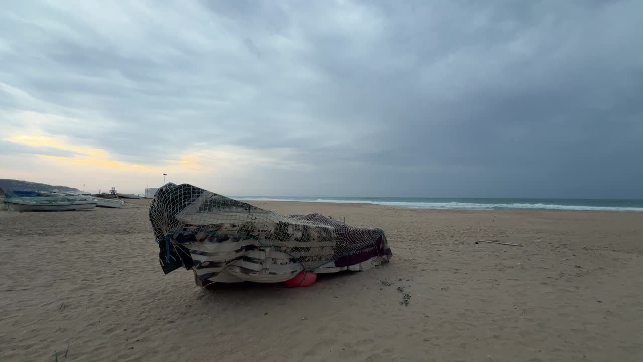 Timelapse of a Boat on the Shore at the Beach