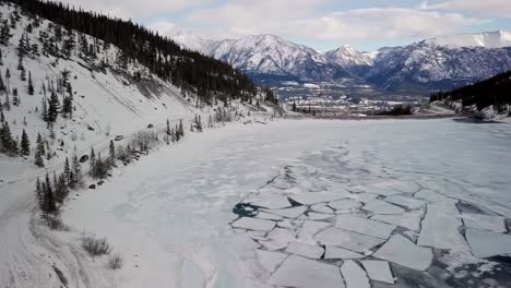 the white pass overlooking a lake in the spray lakes reservoir in canada - aerial