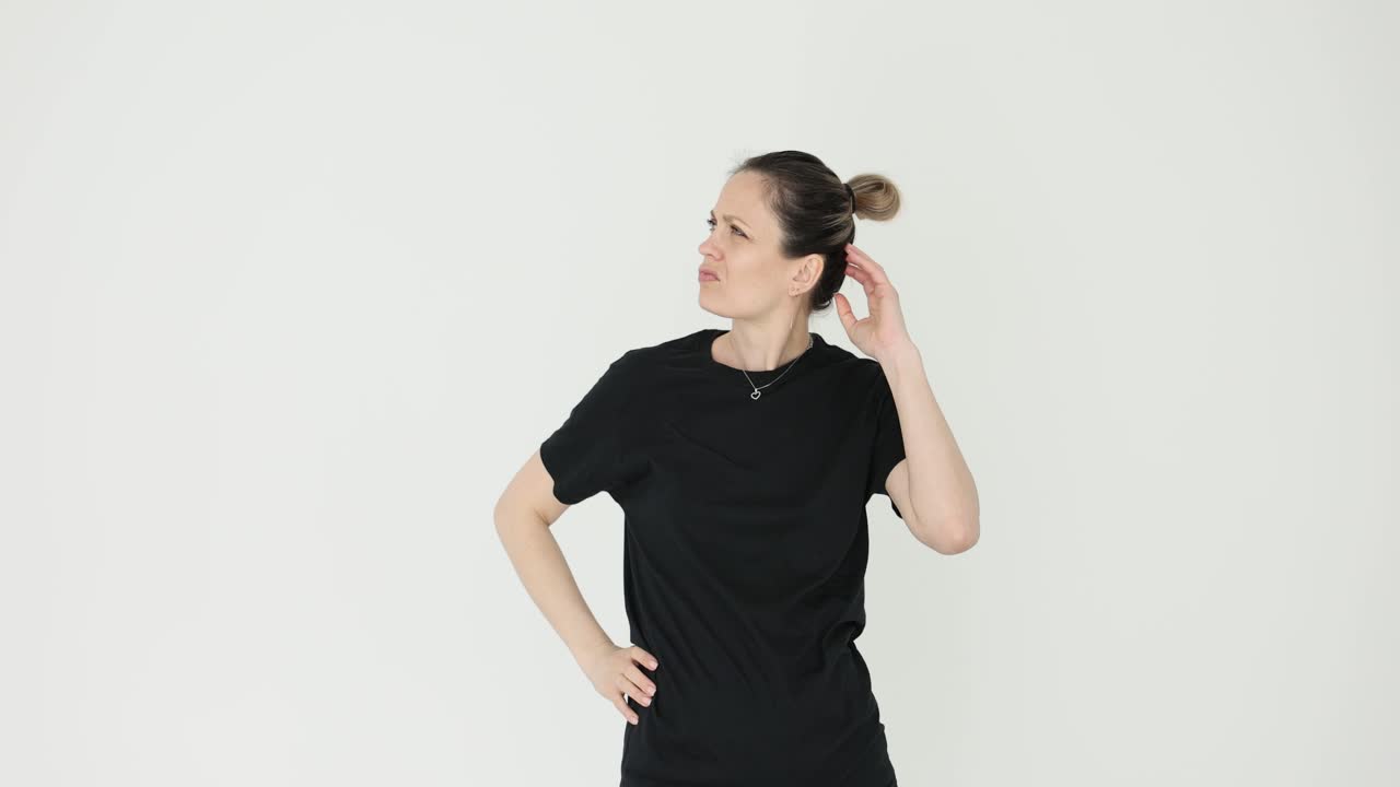 Woman in Black T-shirt with Thinking Expression