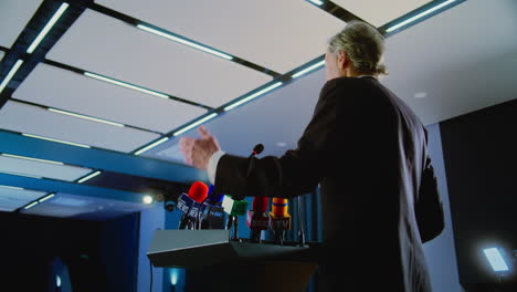 businessman speaking at a press conference