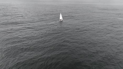 aerial shot of white boat sailing in heart of ocean, puente alto, chile