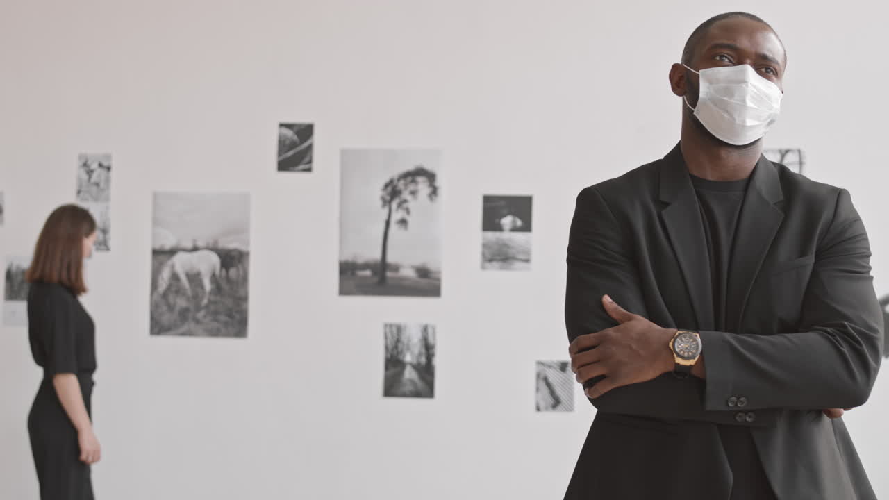 Man Wearing Medical Mask in Gallery