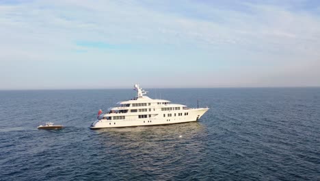 Aerial-Over-A-Large-White-Private-Yacht-Cruising-On-The-High-Seas