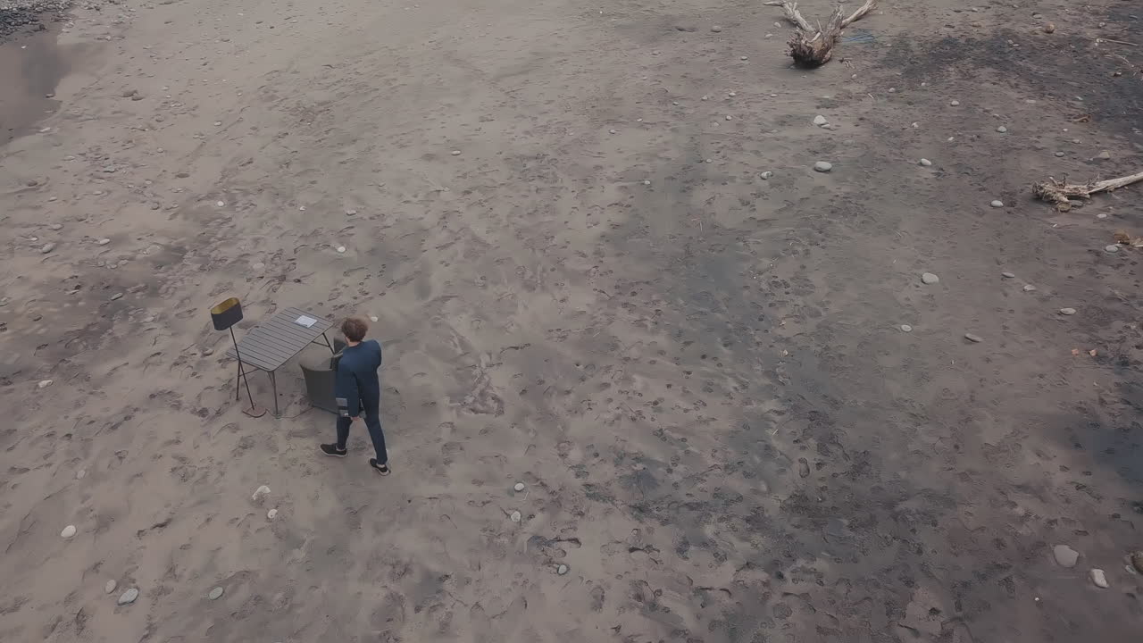 Man Working Alone At Ocean Coast