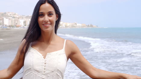 Pretty-Lady-at-the-Beach-Railing-Smiling-at-Camera